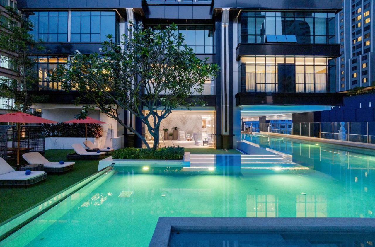 Silq Hotel & Residence, Managed By The Ascott Limited Μπανγκόκ Εξωτερικό φωτογραφία The swimming pool at the hotel