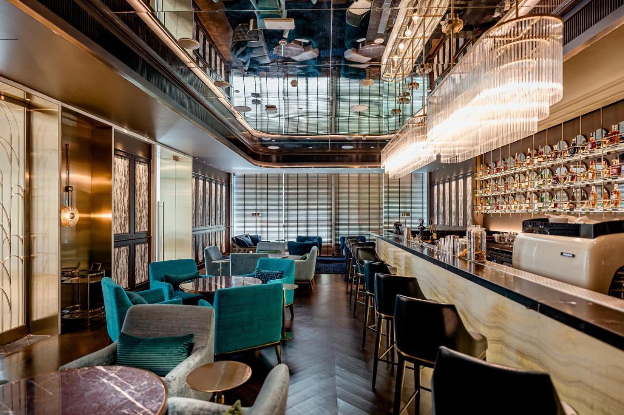 Silq Hotel & Residence, Managed By The Ascott Limited Μπανγκόκ Εξωτερικό φωτογραφία The bar at the 100 Queen's Gate