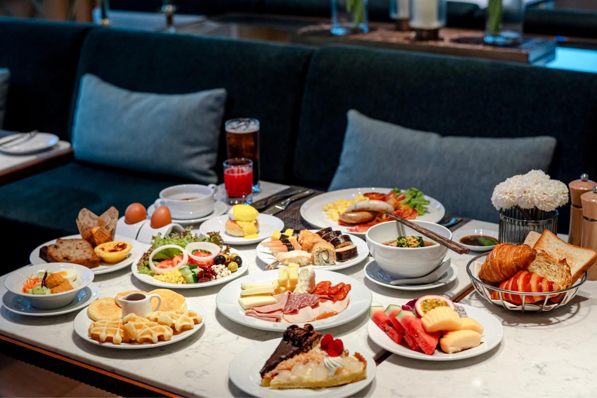 Silq Hotel & Residence, Managed By The Ascott Limited Μπανγκόκ Εξωτερικό φωτογραφία A selection of food at the lounge